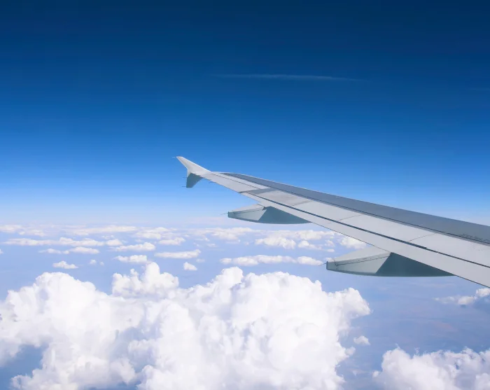 Flyvinge over skyene på vei til Australia