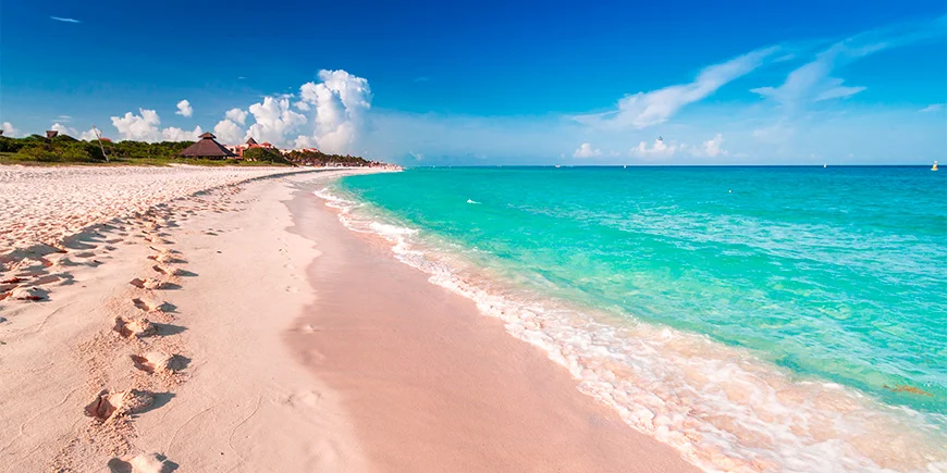 Fotspor i sanden på Playa del Carmen