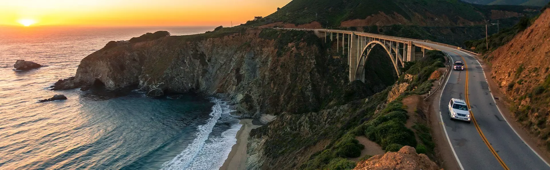 Solnedgang over Bixby Bridge i California